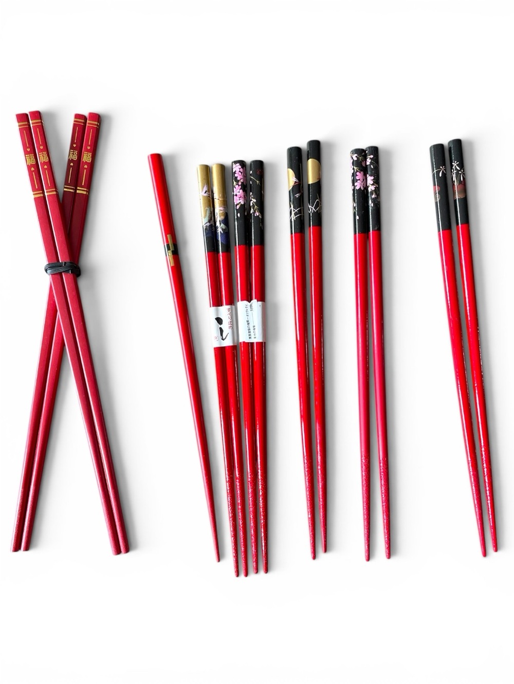 7 sets of vintage, red, lacquered chop sticks, new or lightly used